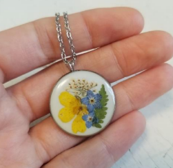 Newfoundland Wildflower Round Pendant Necklaces from Velvet Snow